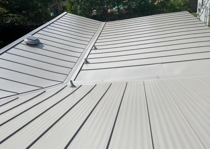 Solar attic fan installed on a metal roof for Roof Ventilation in Phoenixville